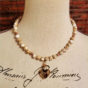 Elegant Gold and White Beaded Necklace With Glass Heart Pendant